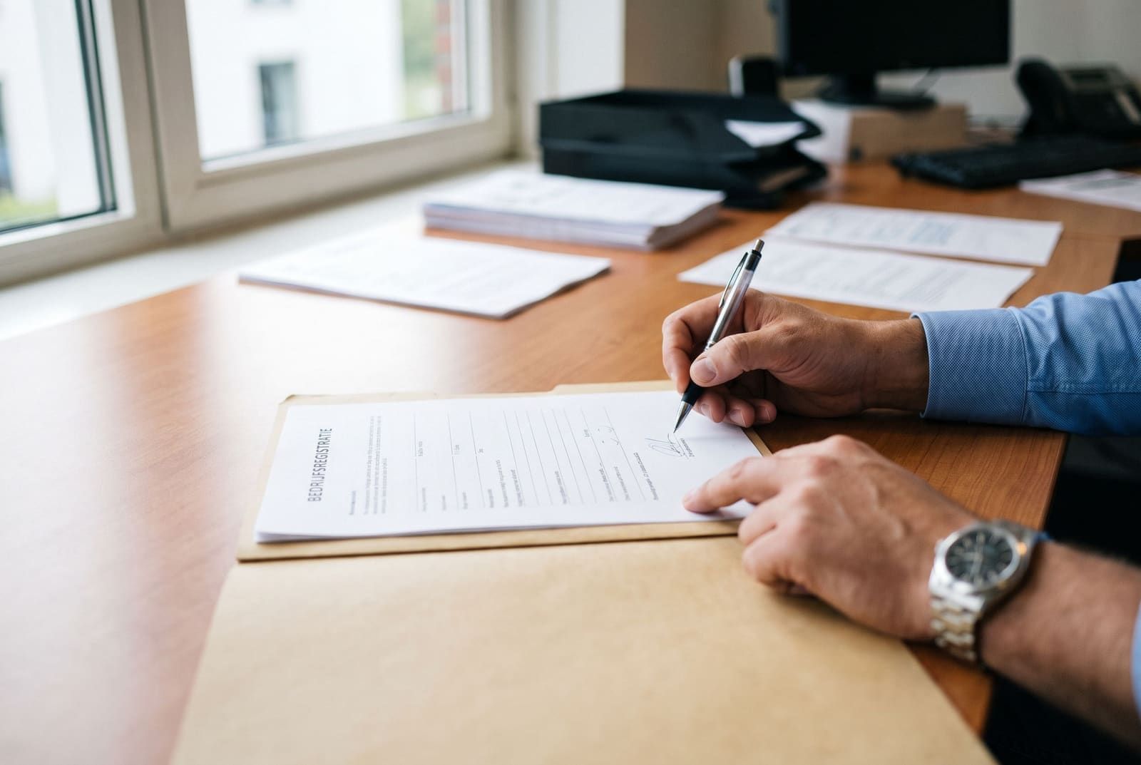Founder signing incorporation documents at a Dutch notary